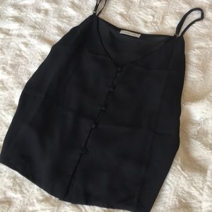 Black tank top. Has one missing button.